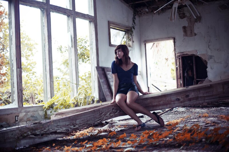 woman in abandoned building