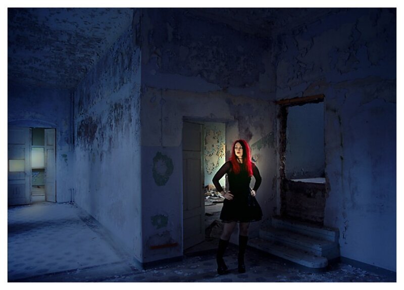 Woman in abandoned building