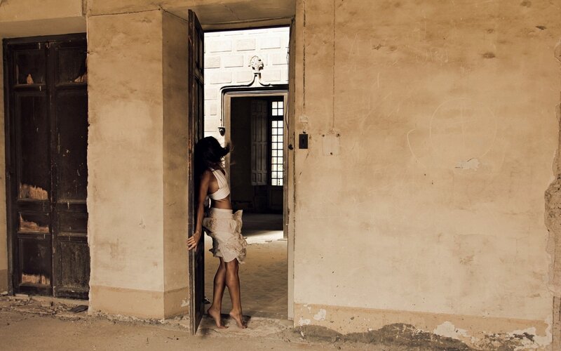 woman in abandoned building