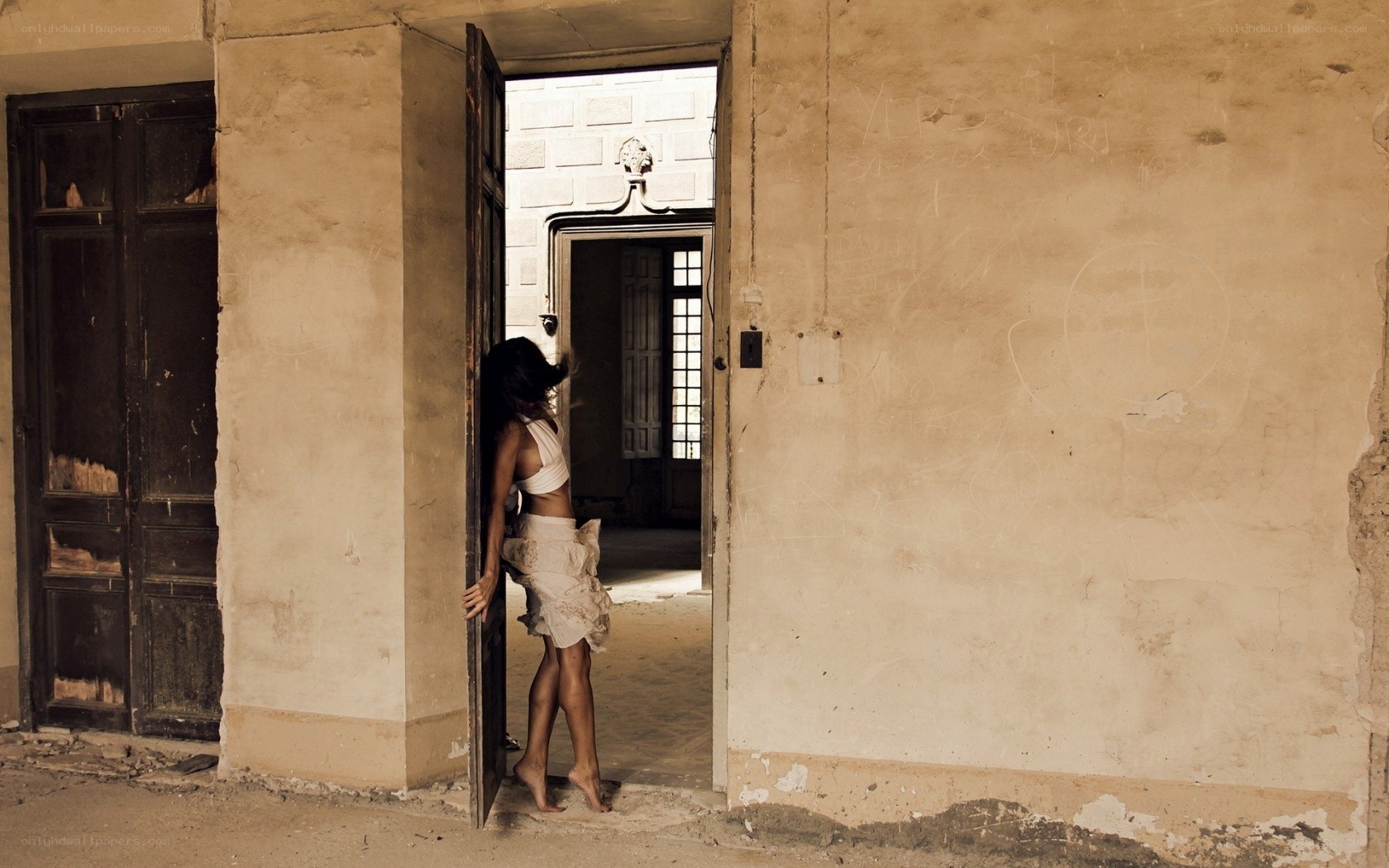 woman in abandoned building