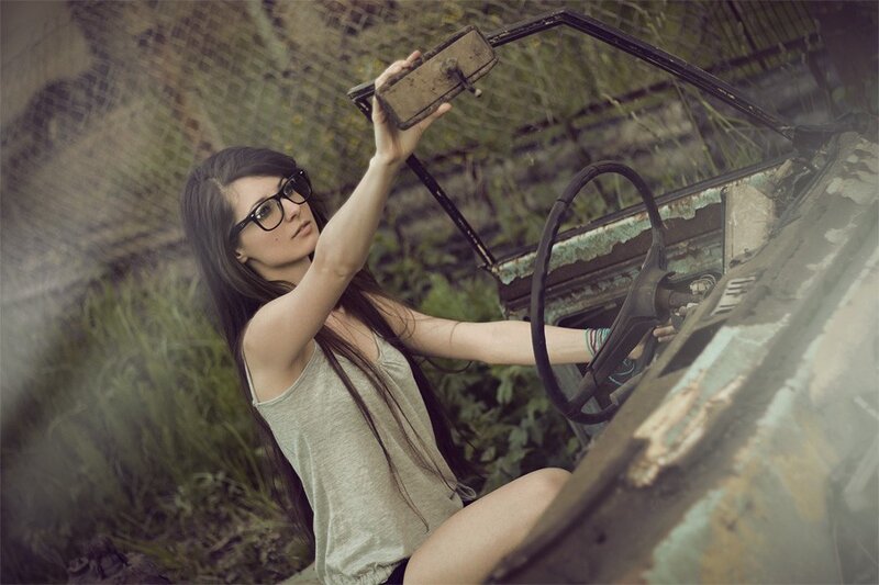 woman in abandoned car