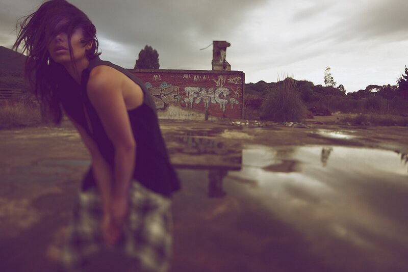woman in abandoned lot