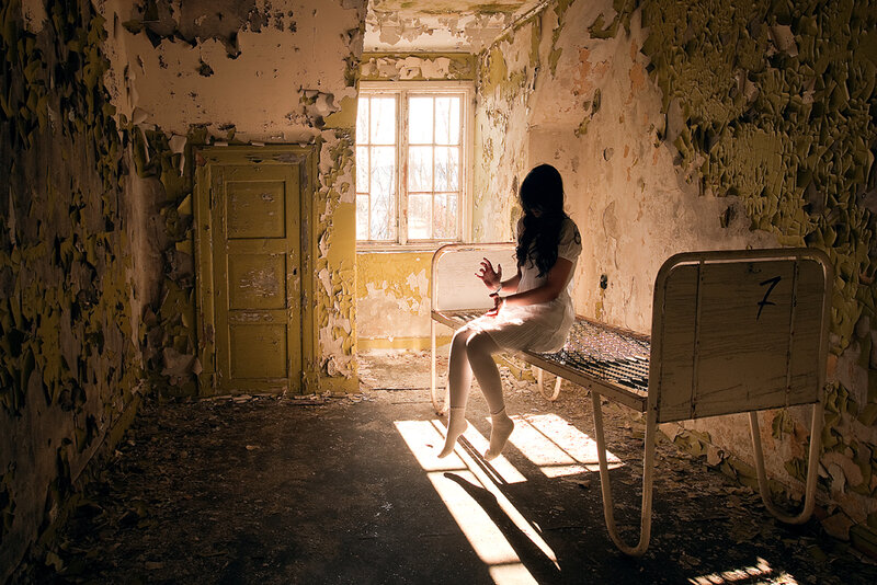 Woman in abandoned room