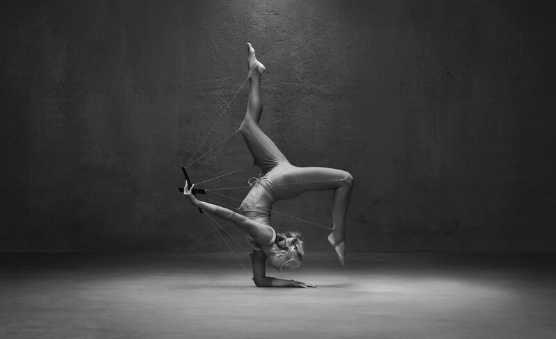 Woman in Acrobatic Pose — Black