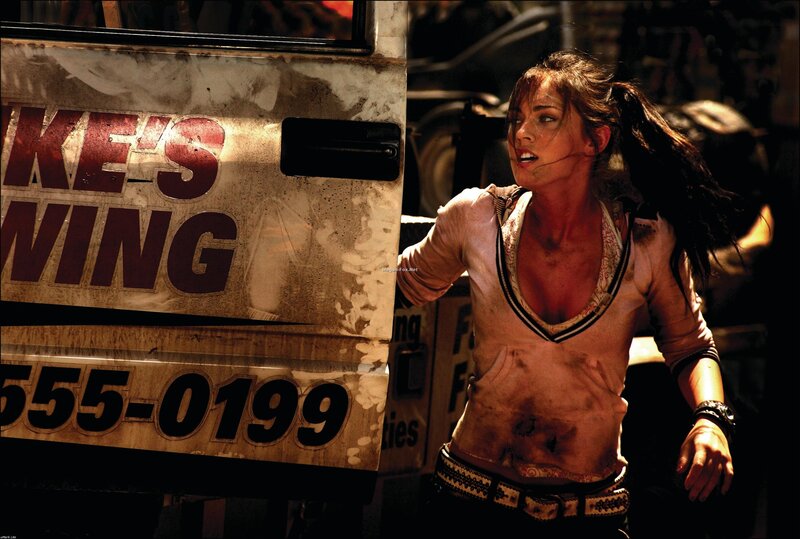 Woman in action scene near truck