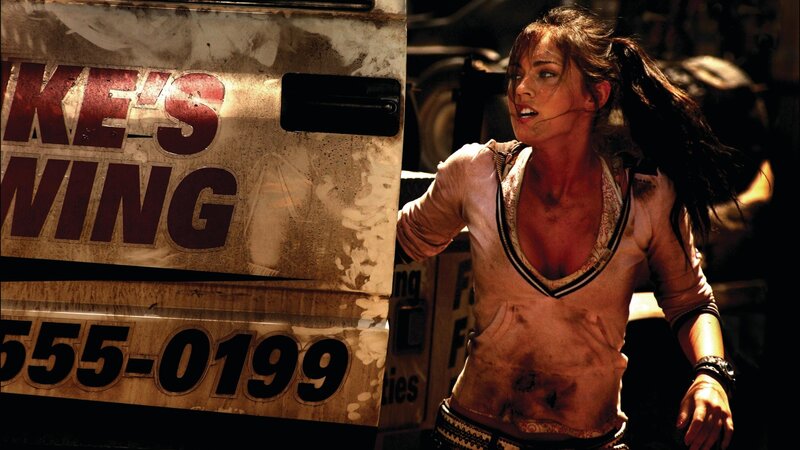 Woman in action scene near truck