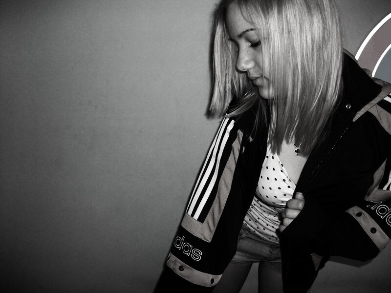 woman in adidas jacket