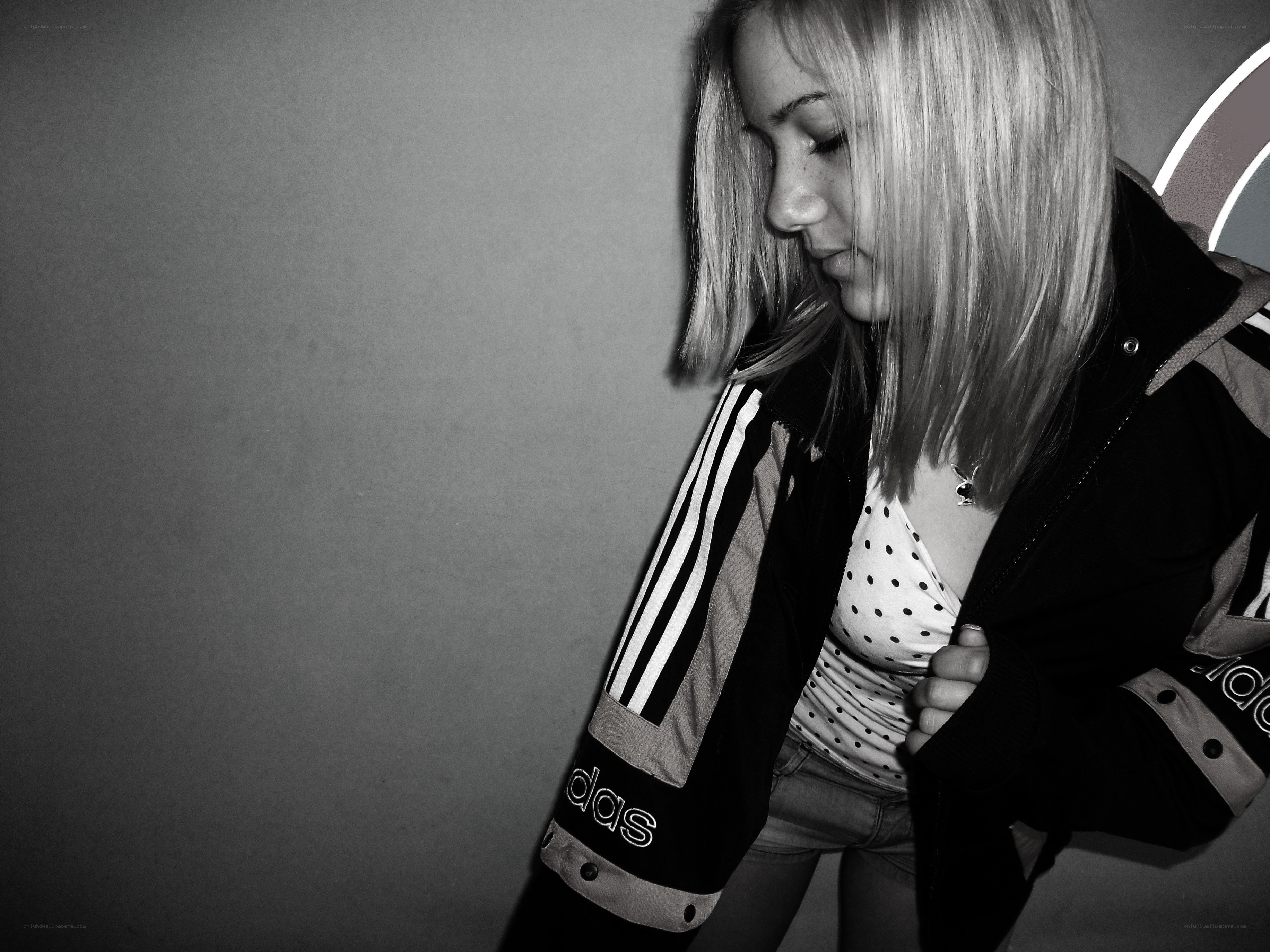 woman in adidas jacket