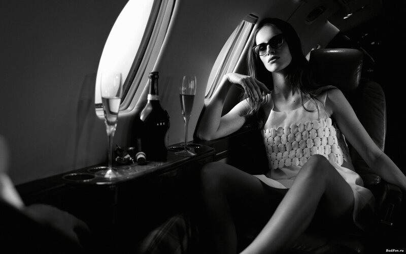 Woman in Airplane Cabin