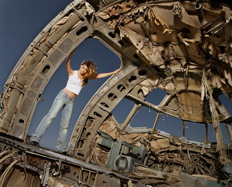 woman in airplane wreckage