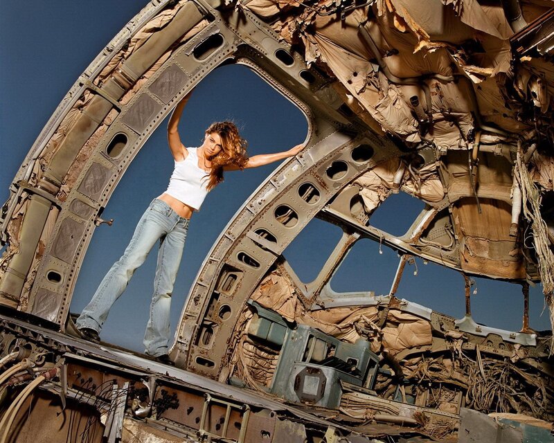 woman in airplane wreckage