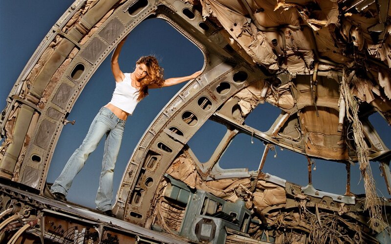 Woman in Airplane Wreckage — Blue, Dramatic