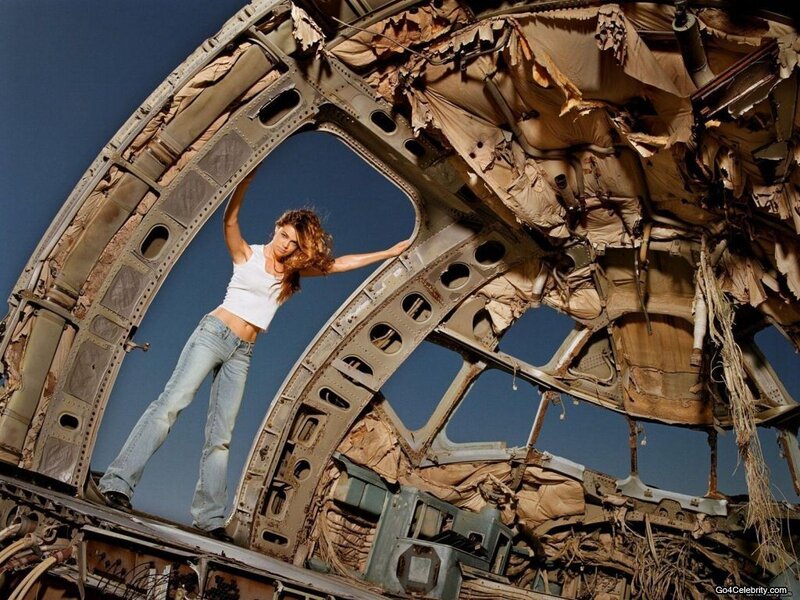 Woman in Airplane Wreckage — Blue