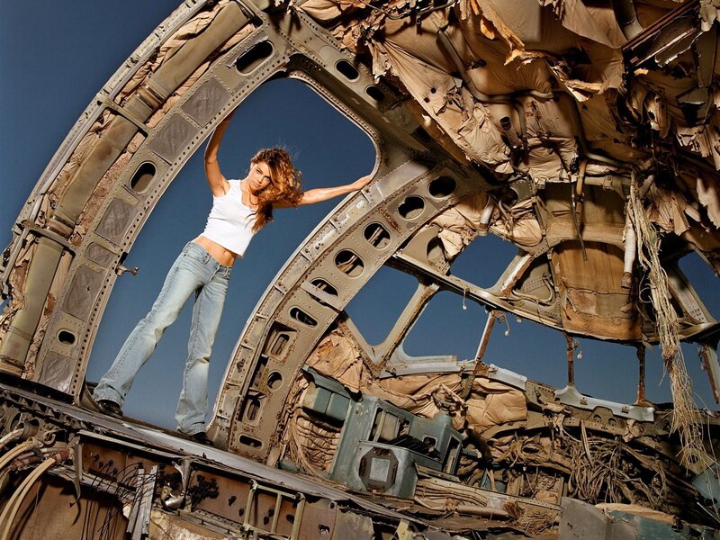 woman in airplane wreckage