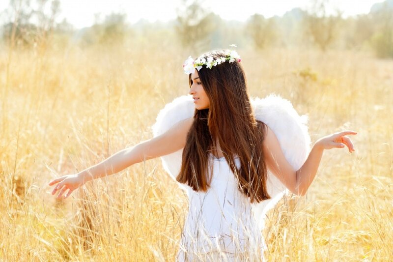 Woman in Angel Costume — White, Serene, Afternoon