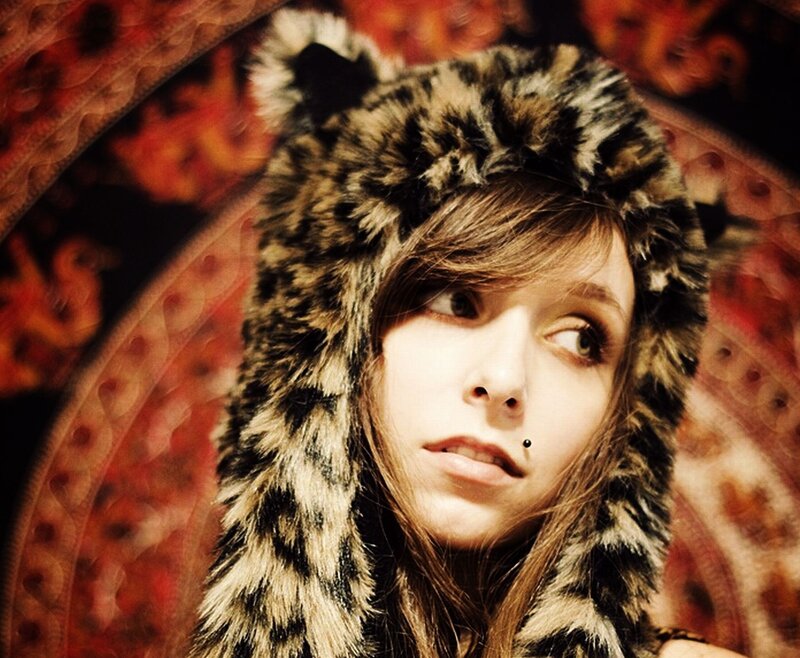 woman in animal hat looking up