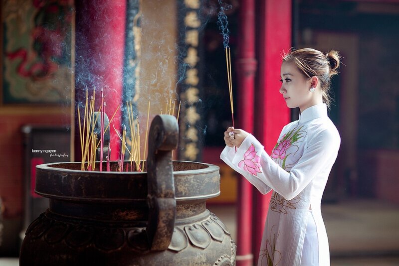 Woman in Ao Dai Praying