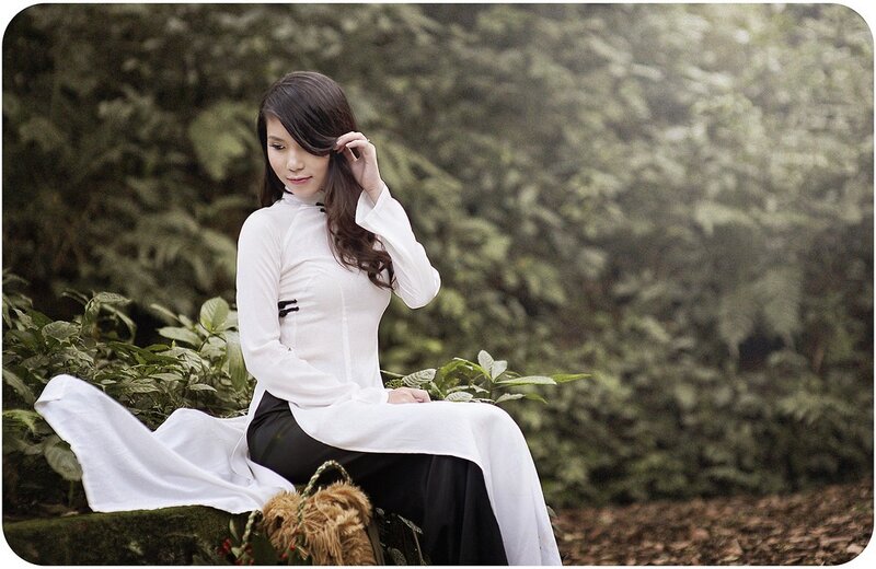 Woman in Ao Dai — White, Serene, Photograph