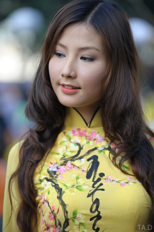Woman in Ao Dai — Yellow