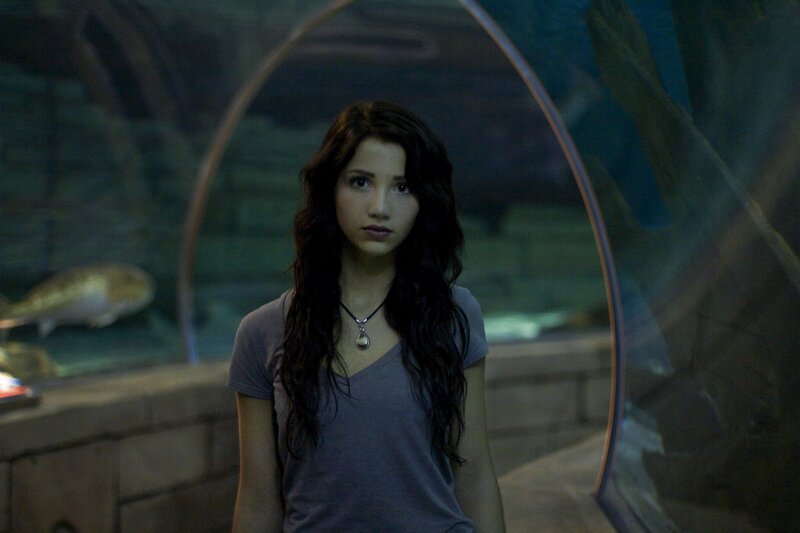 woman in aquarium tunnel