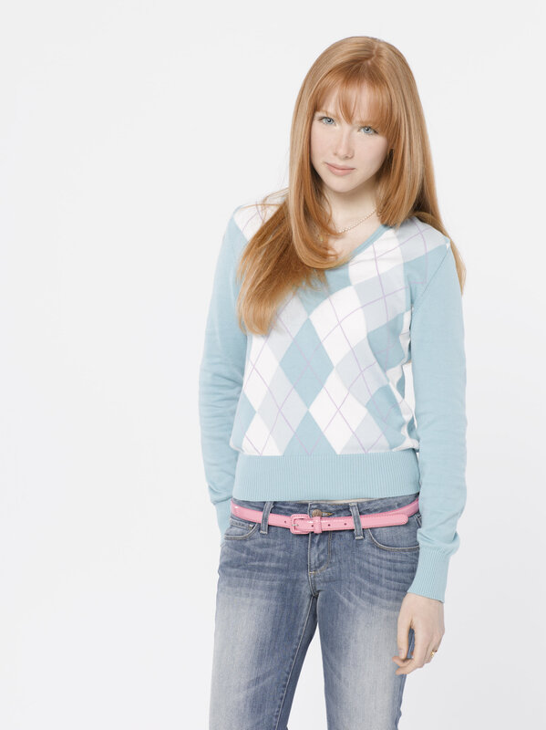 woman in argyle sweater