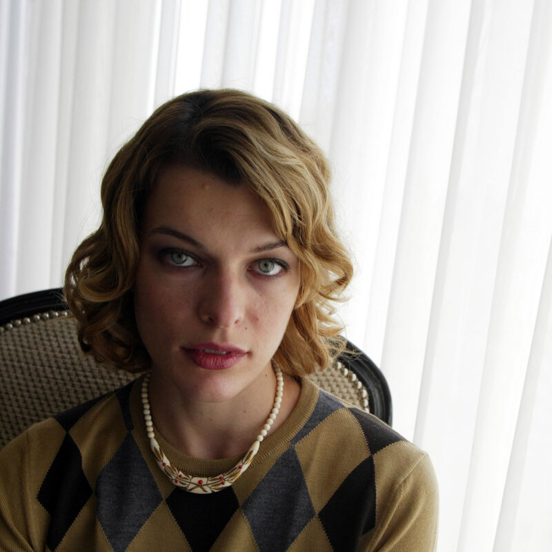 woman in argyle sweater