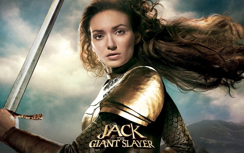 Woman in Armor Holding Sword — Gold