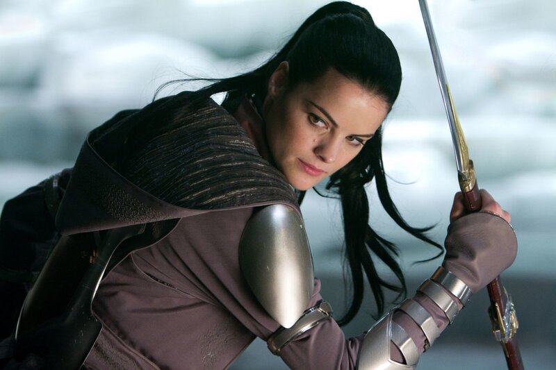 Woman in Armor Holding Sword — Gray