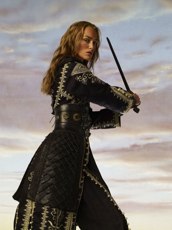 woman in armor holding sword