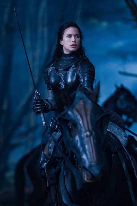 woman in armor on horseback