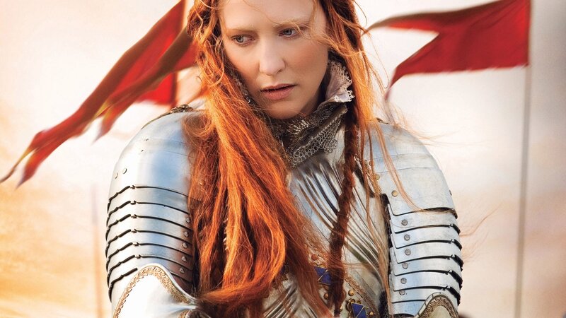 woman in armor with red hair