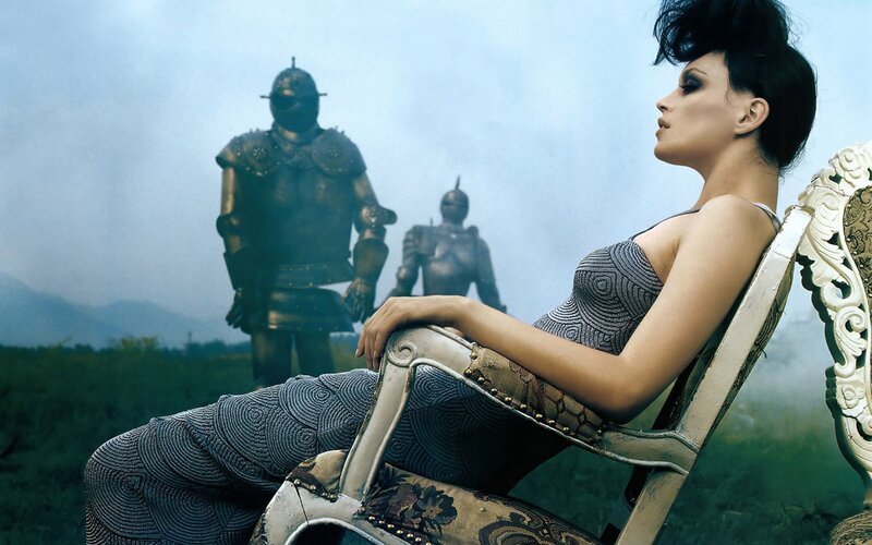 woman in armor with soldiers