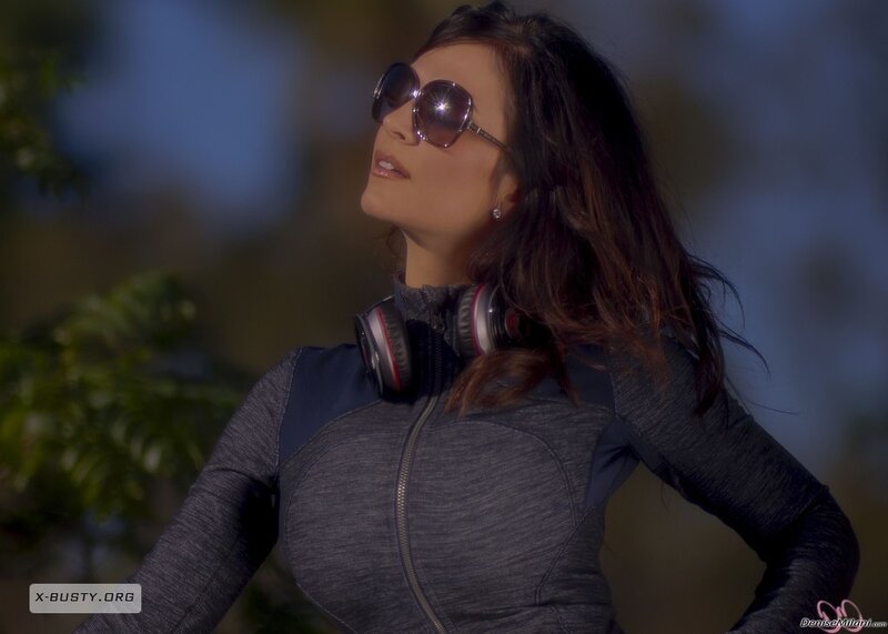 woman in athletic wear with headphones