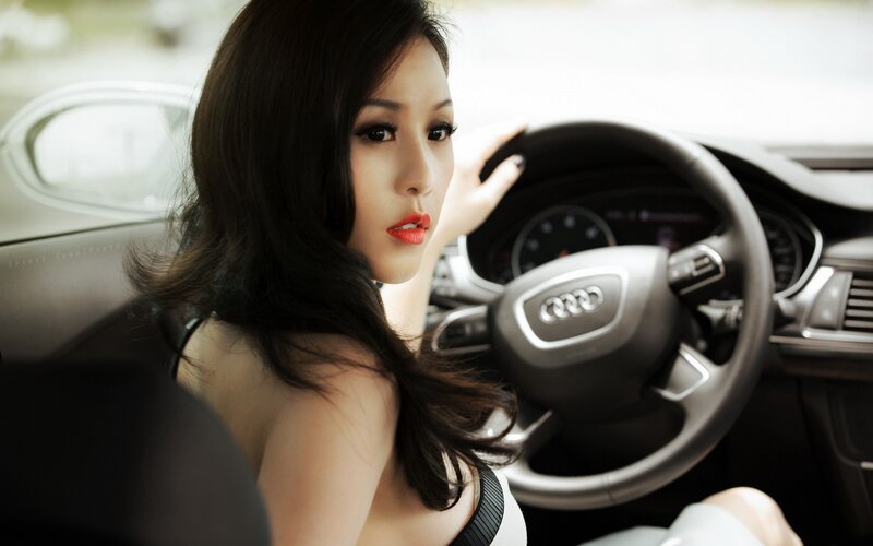woman in audi car interior
