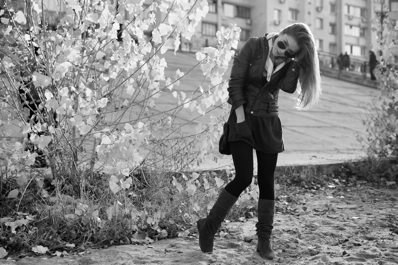 woman in autumn foliage