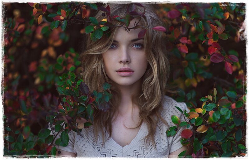 Woman in Autumn Foliage — Green