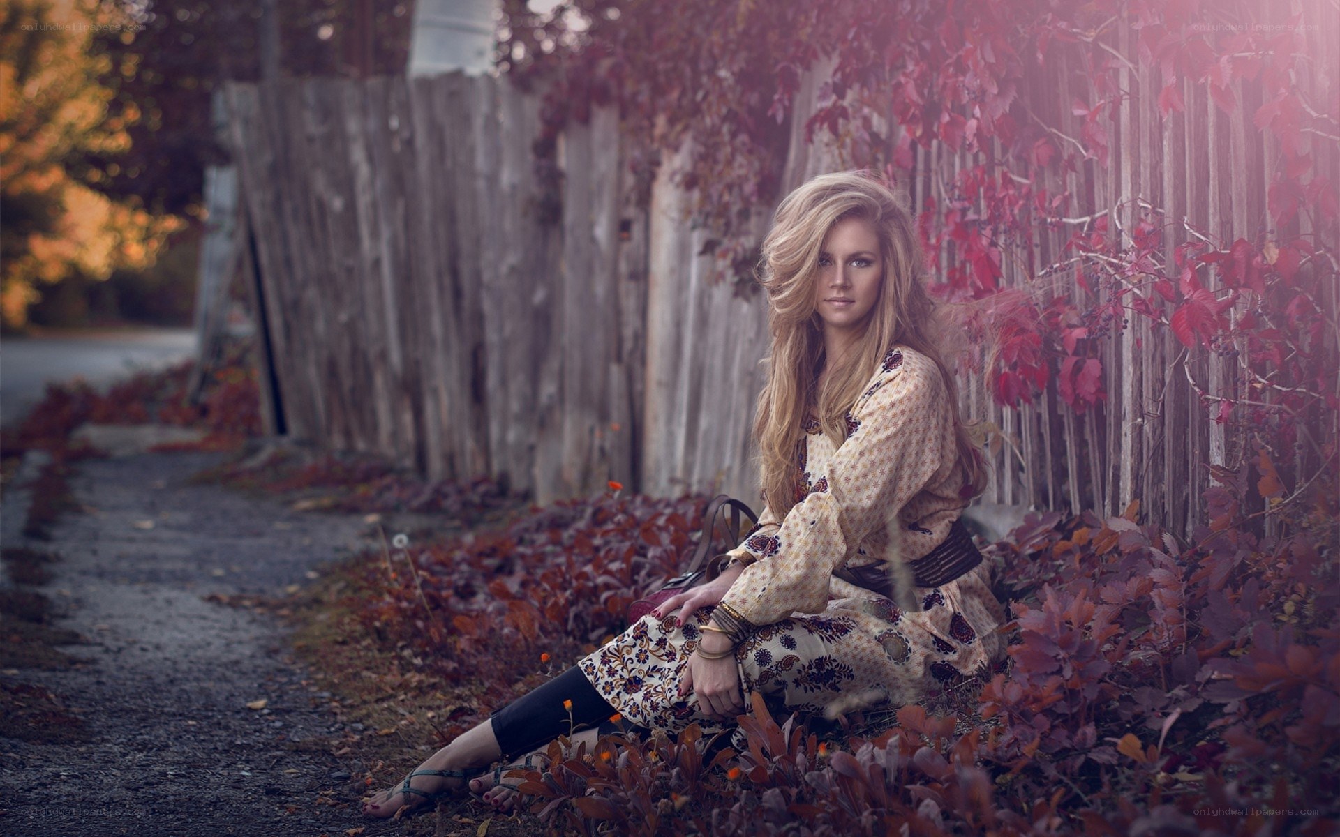 Woman in autumn foliage