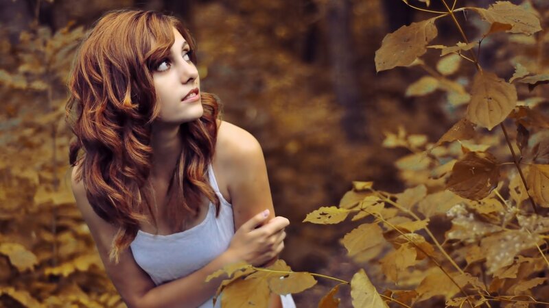woman in autumn forest