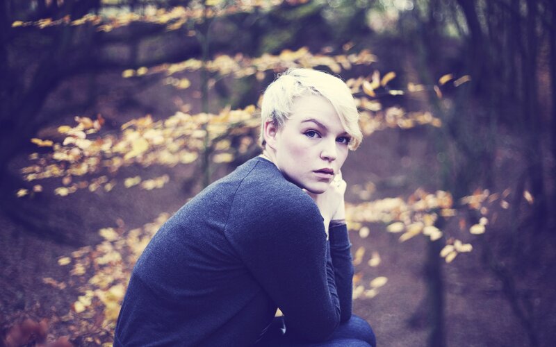 woman in autumn forest