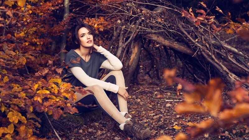 woman in autumn forest