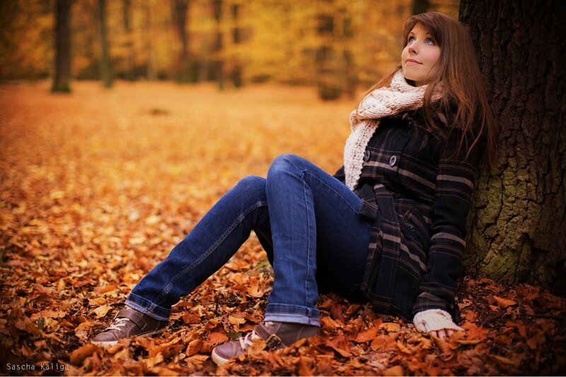 Woman in autumn forest