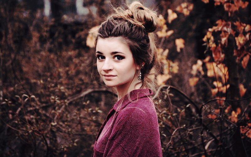 woman in autumn forest