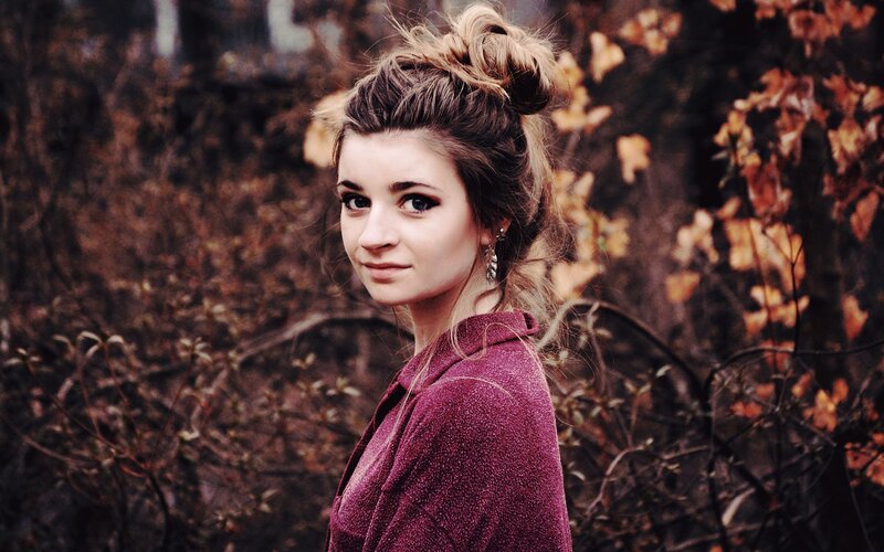 woman in autumn forest