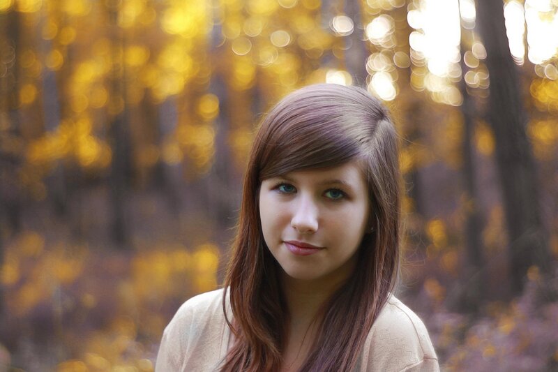 woman in autumn forest