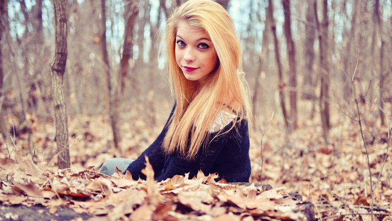 woman in autumn forest