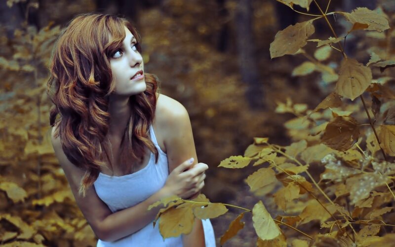 woman in autumn forest