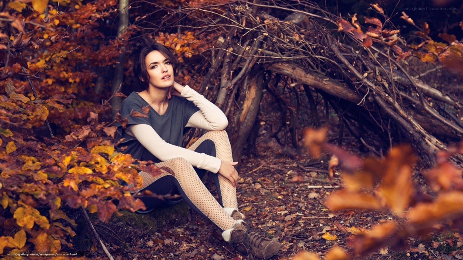 Woman in autumn forest