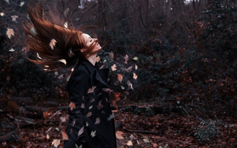 woman in autumn forest
