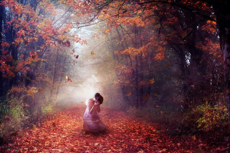 woman in autumn forest