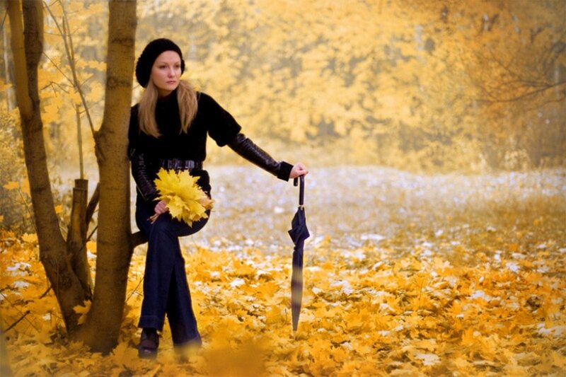 Woman in autumn forest